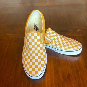 Men’s Vans, yellow/white checkered slip on’s.